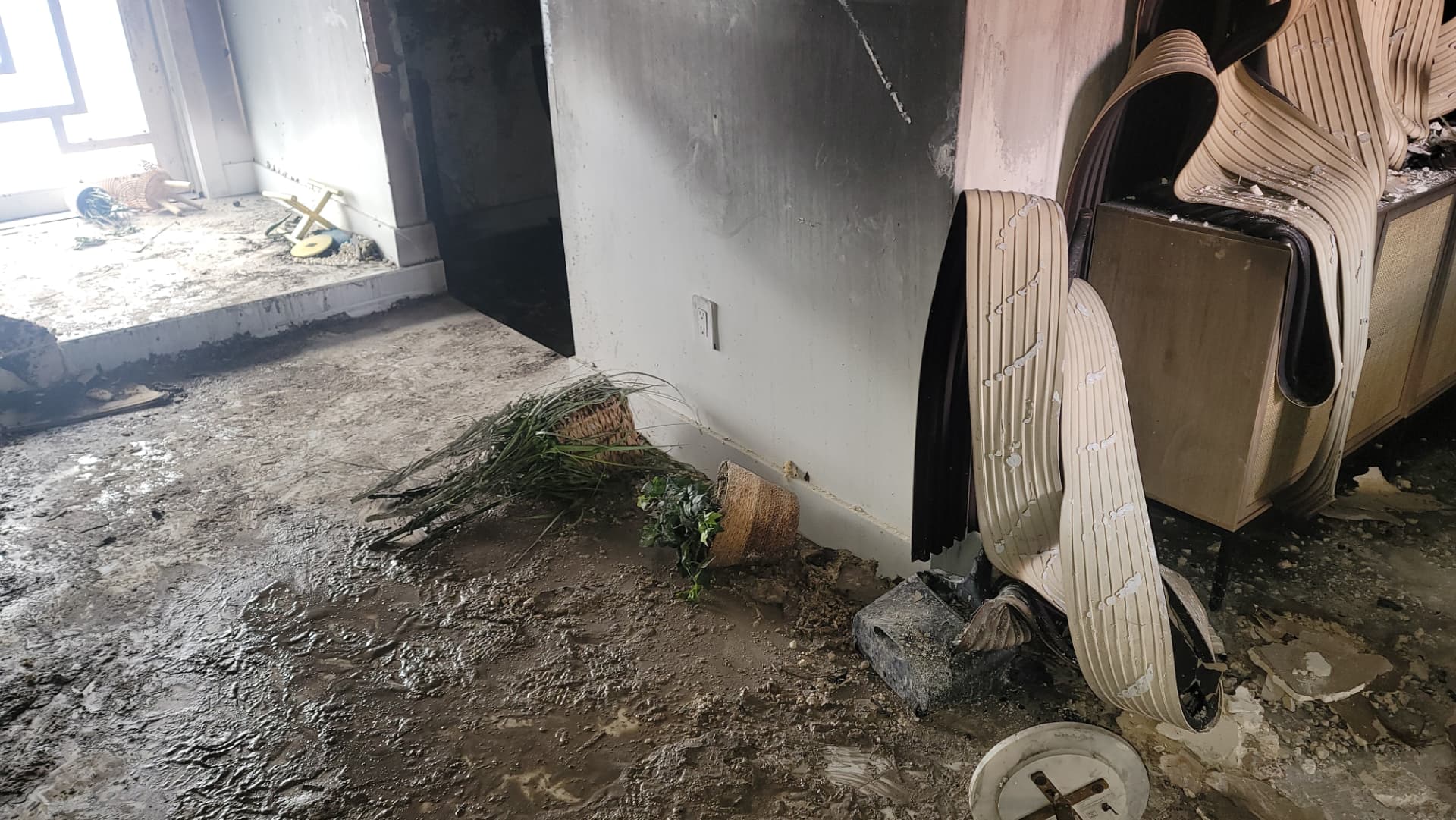 Fire-damaged furniture and household contents awaiting restoration
