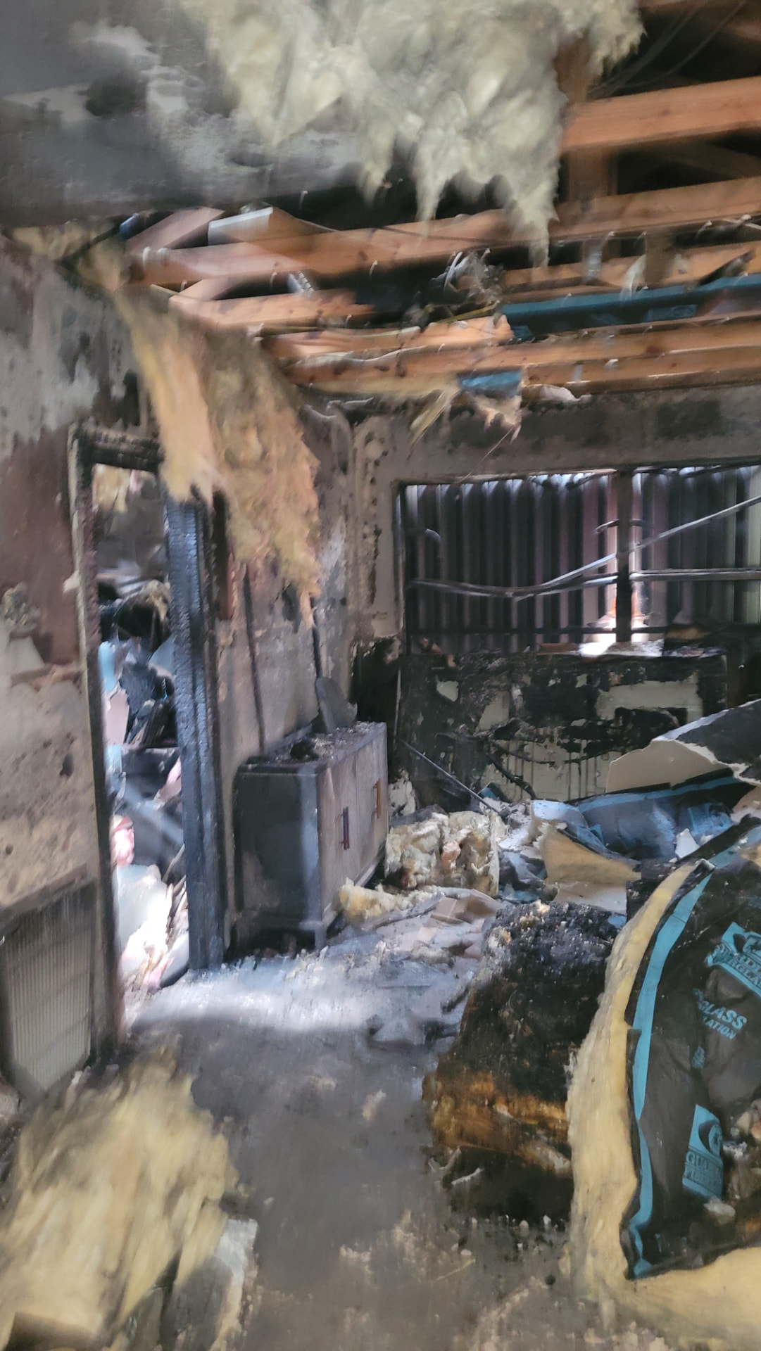 Extensive fire damage documented inside a residential property