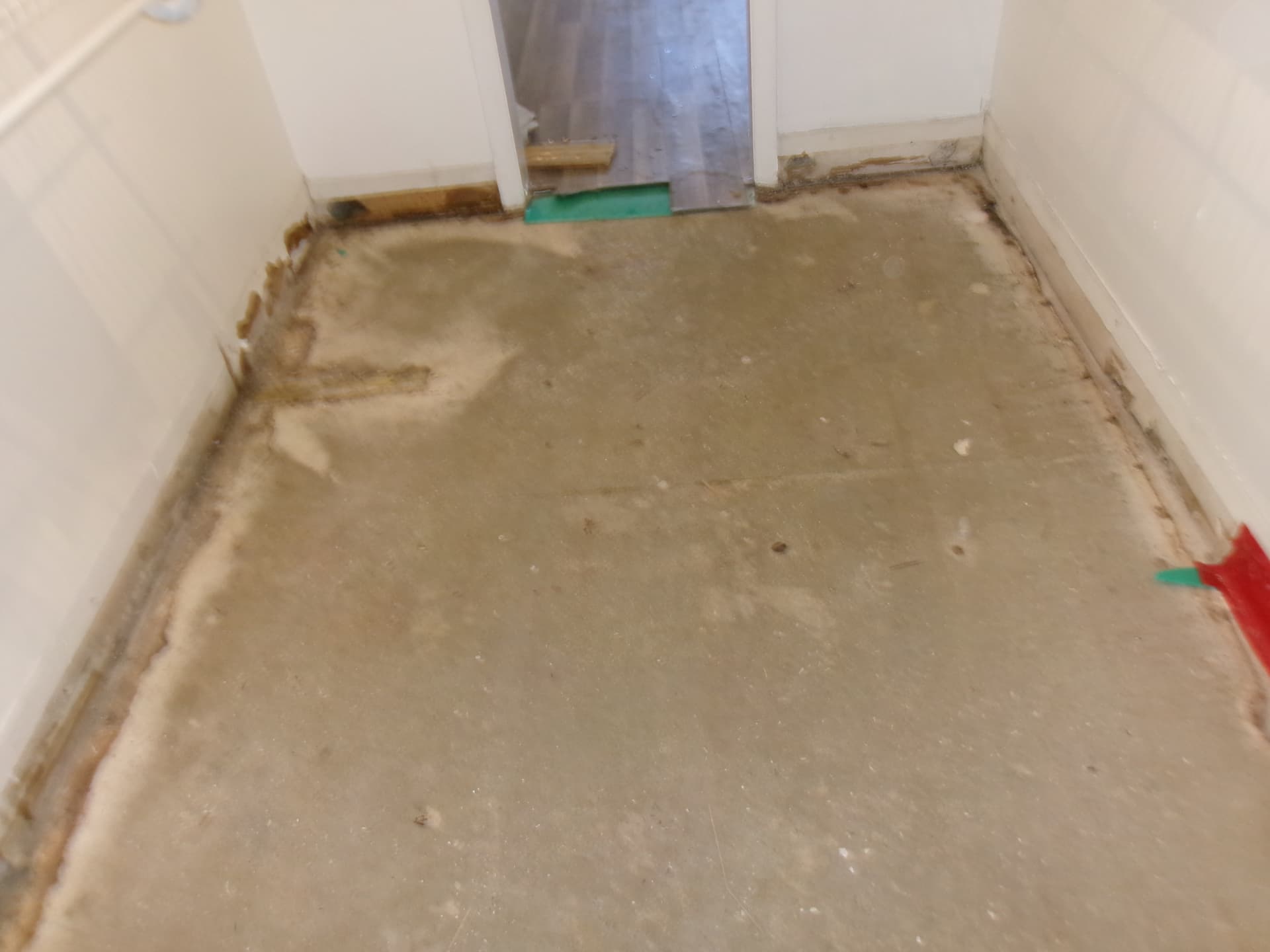 Flooring removed after storm and flood water damage